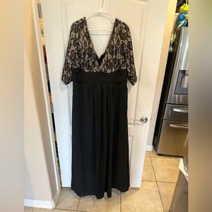 Izidress women’s black dress. No size tag see measurements. NWT